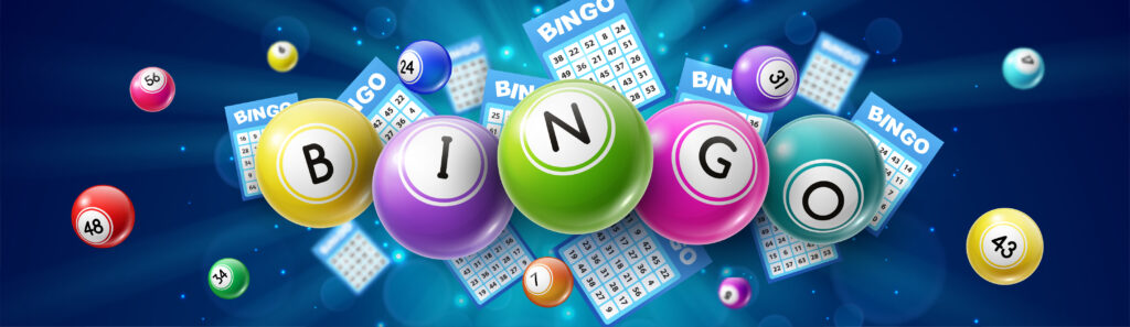 Colorful bingo balls displaying the word BINGO float in front of blue bingo cards and scattered numbered balls, set against a radiant blue background.