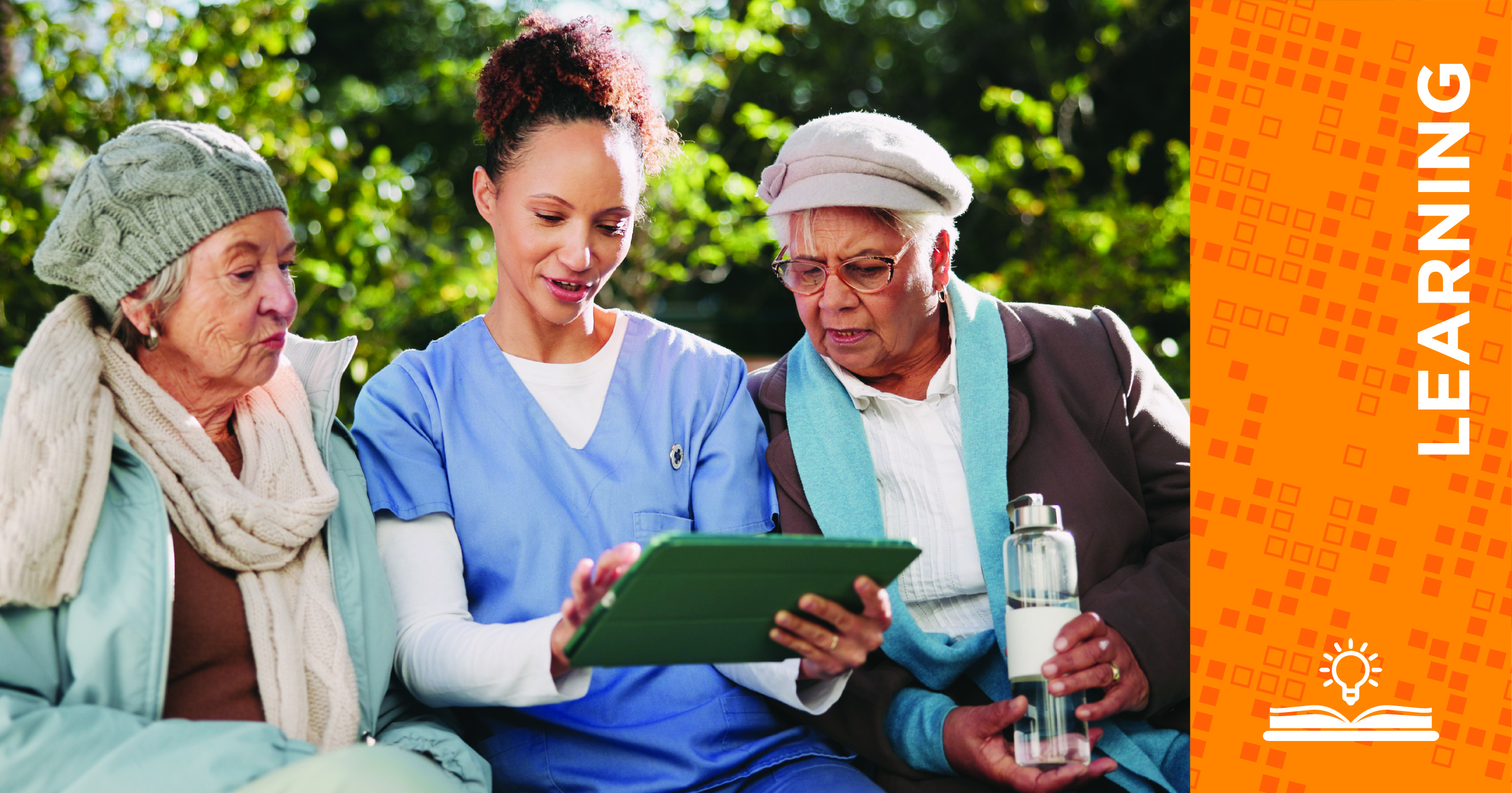 A healthcare worker shows two older women something on a tablet outdoors. All three are seated and engaged. Beside them is an orange graphic with the word LEARNING and an open book icon.