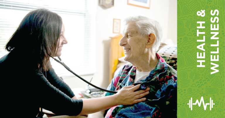 healthcare provider checking on senior