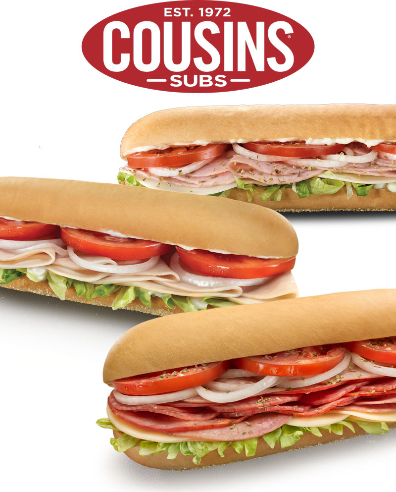 Three deli subs filled with lettuce, tomatoes, meats, and cheese sit below a red Cousins Subs Est. 1972 logo on a white background.