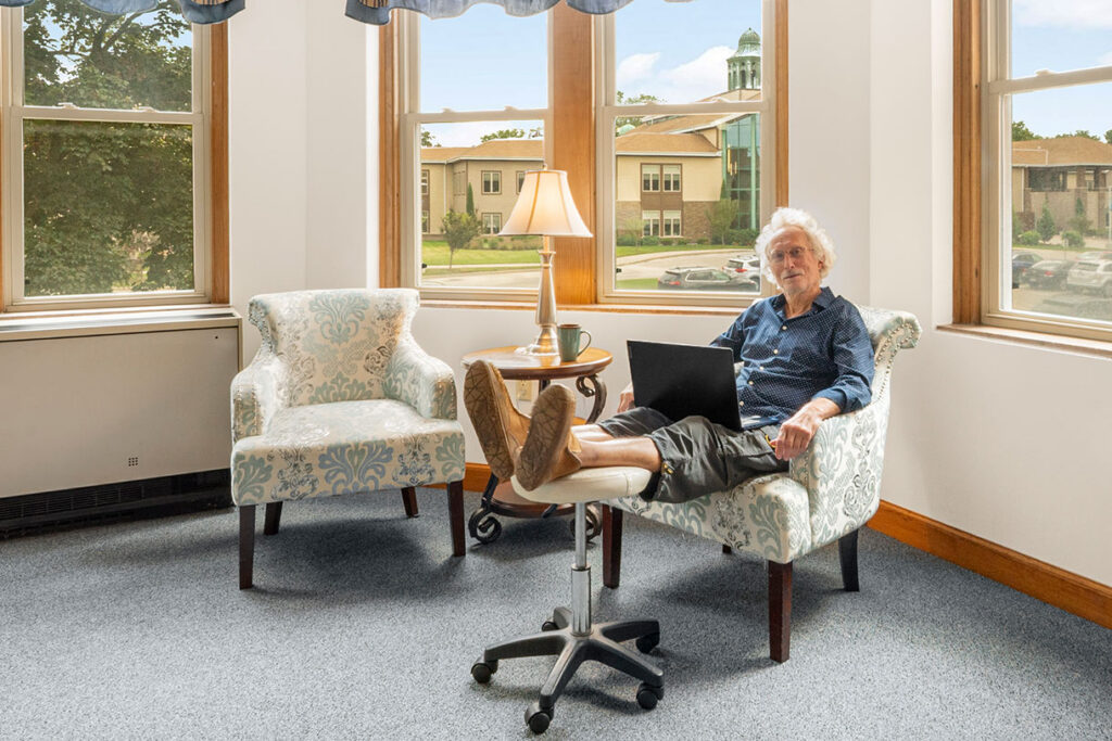 Happy Senior Living Resident with Feet Up