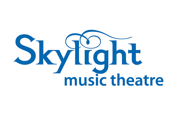 Blue text logo reads Skylight music theatre on a white background, with a decorative swirl above the “l” in “Skylight.”.