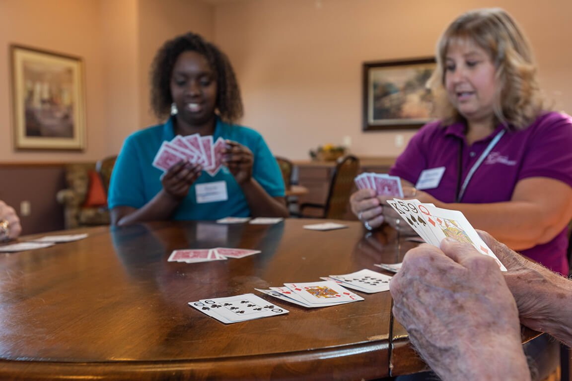 St. Catherine Commons Residents enjoying a card game