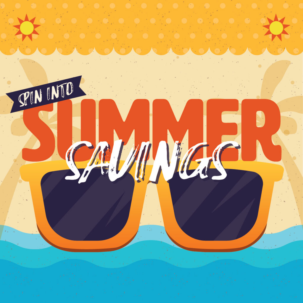 Colorful graphic with the words “Spin Into Summer Savings.” Large orange sunglasses sit on sand with blue water below and a sunny, decorative background above. The text is bold and playful, evoking a summer theme.
