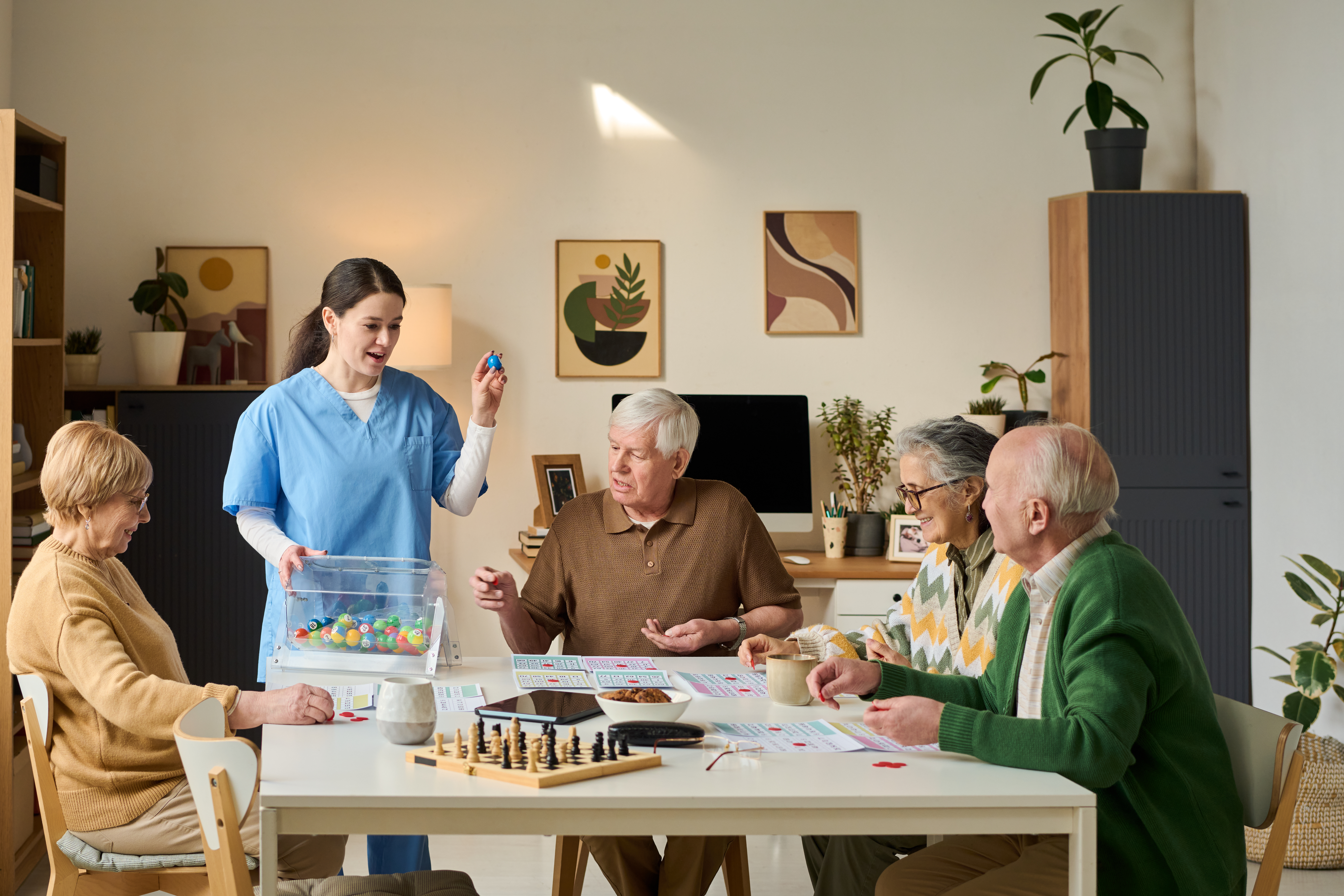 group of memory care seniors playing a cognitive development game to help reduce sundowning