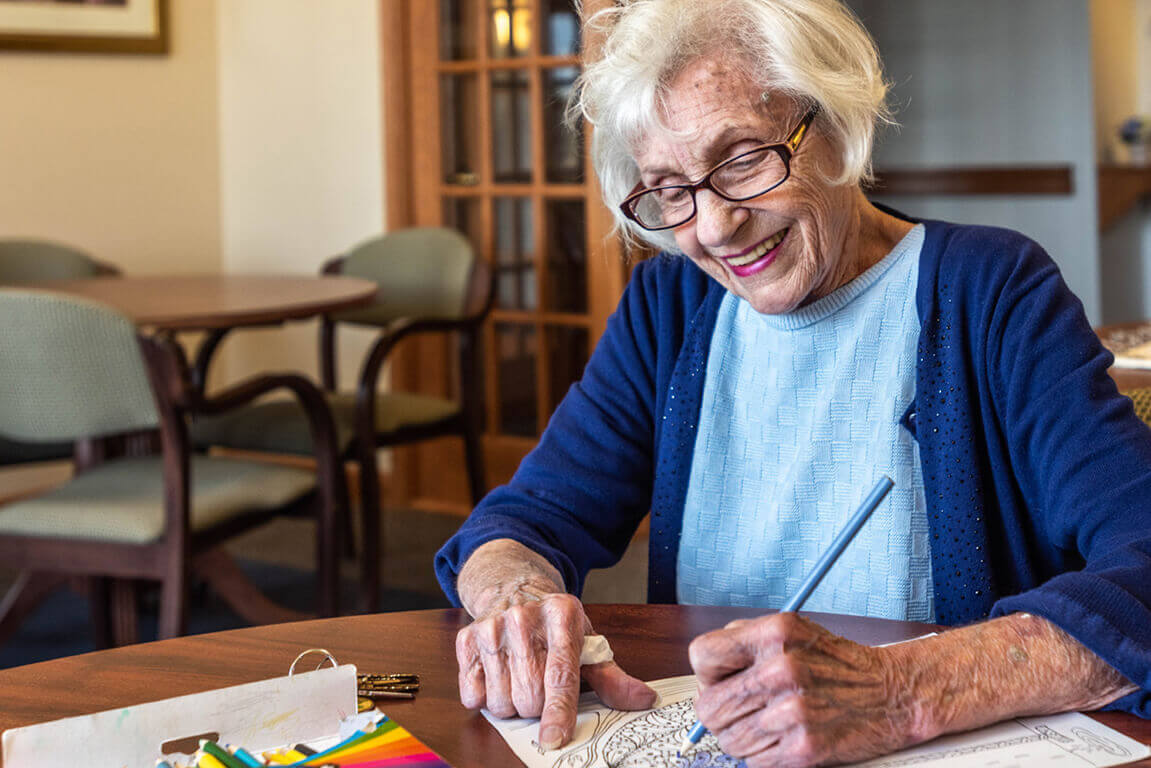 Independent Living Resident Writing a Letter